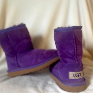 Little girl’s purple Uggs. Used in good condition.